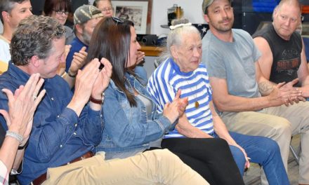 Woolen Mill celebrates 154th birthday, honors longtime employee